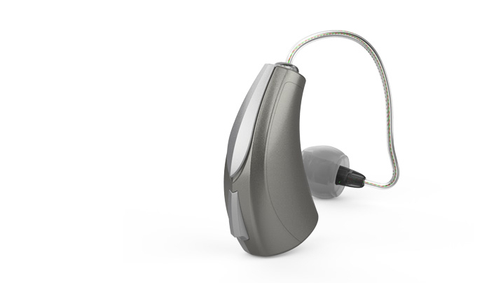 NuEar: silberfarbenes Hörgerät mit externem Hörer
